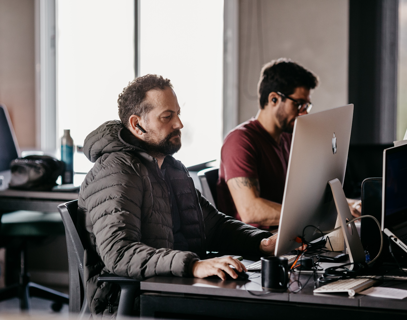 Marketing professionals collaborating in a modern startup office